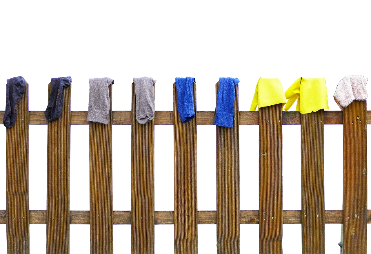 fence, laundry, dry, wooden fence, paling, socks, rubber gloves, rag, cleaning rags, hung up, washed, dry laundry, cleaning day, cleaned, isolated, hang laundry, fence, socks, socks, socks, socks, socks, rubber gloves, rag. Cleaning Company Payroll Setup: US vs Canada Rules for Maid Teams